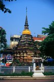 The old chedi of Wat Cheitta (วัด เชษฐา) is located to the northeast of the intersection of Ratchadamnoen and Prapokklao Roads, and set within a fenced-off section of the Nam Rong School grounds. The only record of the temple states 'that the name is related to King Chaicheitta of Luang Phrabang who ruled Chiang Mai during the 15th century’ [King Setthathirat, 1546-51].<br/><br/>

Chiang Mai, sometimes written as 'Chiengmai' or 'Chiangmai', is the largest and most culturally significant city in northern Thailand, and is the capital of Chiang Mai Province. It is located 700 km (435 mi) north of Bangkok, among the highest mountains in the country. The city is on the Ping river, a major tributary of the Chao Phraya river.<br/><br/>

King Mengrai founded the city of Chiang Mai (meaning 'new city') in 1296, and it succeeded Chiang Rai as capital of the Lanna kingdom. The ruler was known as the Chao. The city was surrounded by a moat and a defensive wall, since nearby Burma was a constant threat.<br/><br/>

Chiang Mai formally became part of Siam in 1774 by an agreement with Chao Kavila, after the Thai King Taksin helped drive out the Burmese. Chiang Mai then slowly grew in cultural, trading and economic importance to its current status as the unofficial capital of northern Thailand, second in importance only to Bangkok.
