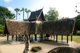 Wat Ton Kwen (วัด ต้น เกว๋น), more formally known as Wat Inthrawat (วัด อินทราวาส), means ‘Temple of Sugar Palms’ in kham muang or Northern Thai, and sure enough the rustic temple, set in a small village amid verdant rice paddies, is surrounded by tall and elegant sugar palms.<br/><br/>

Built at the start of the reign of Chao Kawilorot (1856-70) in 1856, Wat Ton Kwen is among the finest and purest examples surviving of traditional 19th century wooden Lan Na temple architecture. No doubt because of its small size and relative isolation, it has been spared the ‘improvements’ and other indignities suffered not just by most of its contemporary structures, but also by much older Lan Na religious buildings.<br/><br/>

The most distinctive features at Wat Ton Kwen are the typically Lan Na viharn or gabled assembly hall, and an unusual cruciform, four-porch mondop or open-sided pavilion.